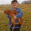 Boy Holding Easter Egger Chicken