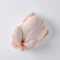 overhead view or raw whole chicken