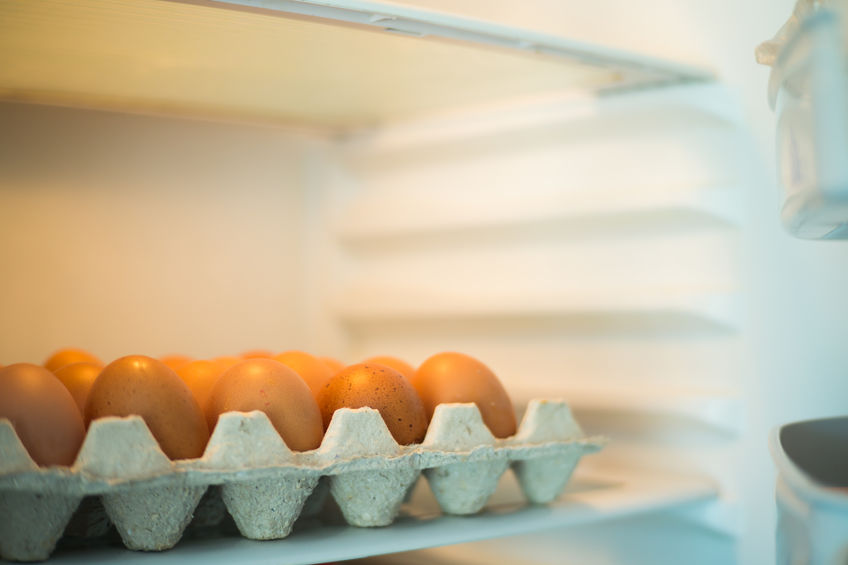 carton of eggs in refrigerator